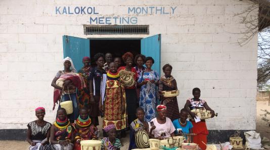 Women in front of Kalokol Monthly Meeting in Turkana, Kenya