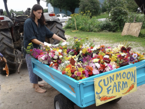 Maggie with flowers at Sun Moon Farm