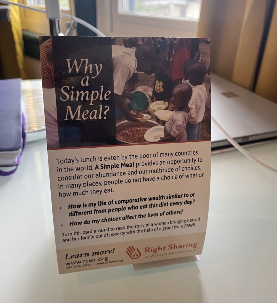 A Simple Meal table tent sits on a table 